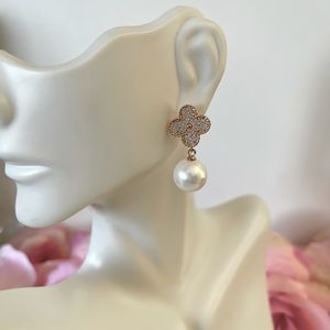 Delicate clover dangle earrings